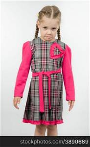 Portrait of upset four-year girl. Half-length portrait upset and unhappy four-year girl Europeans