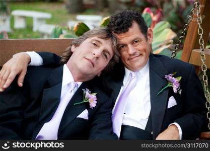 Portrait of very handsome gay male couple on their wedding day.