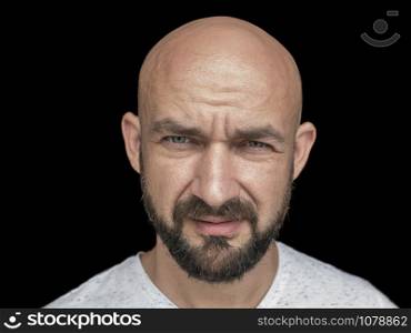 Portrait Of white bald man with beard in white t-shirt. isolate on a black background