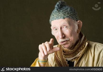 Portrait of wise guru with knit cap