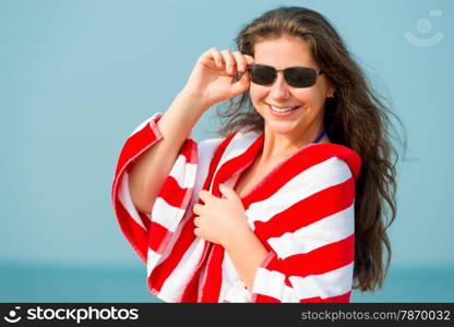 portrait of woman 30 years resting on the beach