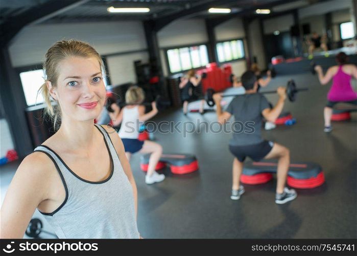 Portrait of woman at exercise class