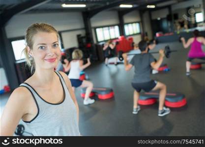 Portrait of woman at exercise class