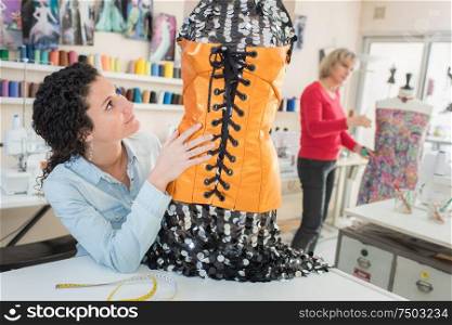 portrait of woman during sewing process