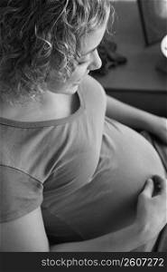 Portrait of woman five months pregnant