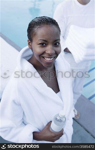 Portrait of woman in bathrobe, outdoors