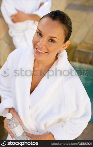 Portrait of woman in bathrobe outdoors