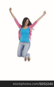 Portrait of woman jumping in mid-air