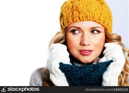 Portrait of woman on white background wearing woolen accessories
