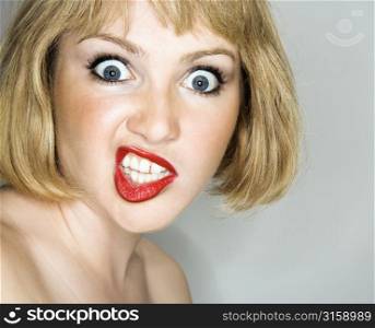 Portrait of woman pulling a funny face