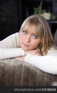 portrait of woman relaxing on the couch