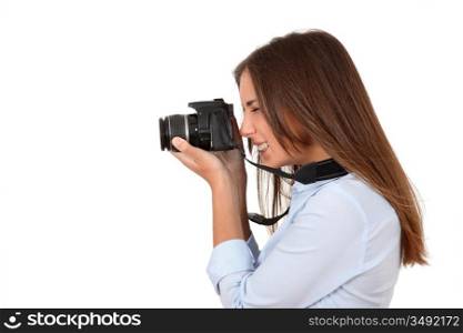 Portrait of woman using reflex digital camera
