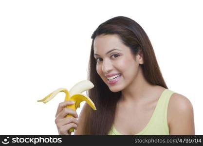 Portrait of woman with a banana