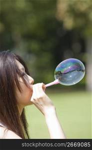Portrait of woman with bubbles