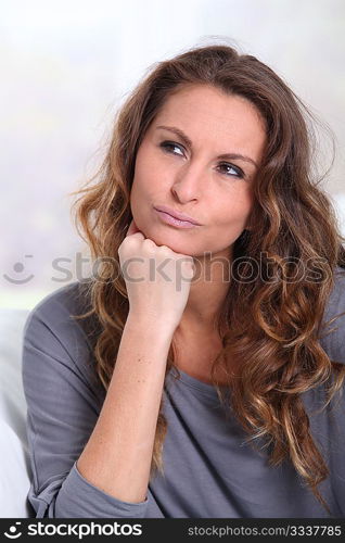 Portrait of woman with doubtful look