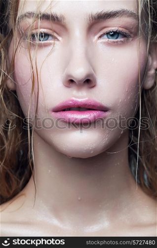 portrait of woman with drops on face