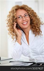 Portrait of woman with eyewear talking on the phone