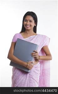 Portrait of woman with file smiling