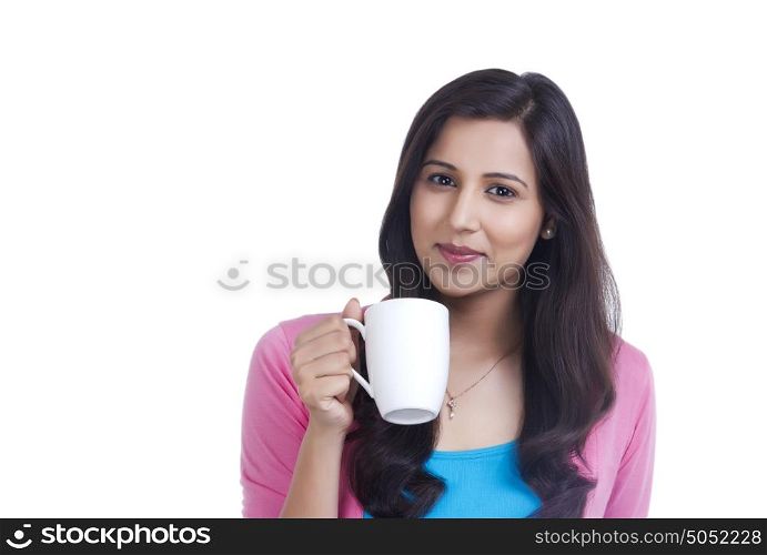 Portrait of woman with mug of tea