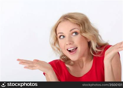 Portrait of woman with red shirt having surprised look