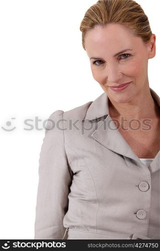 Portrait of woman with shy smile