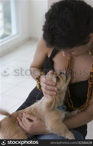 Portrait of woman with small dog
