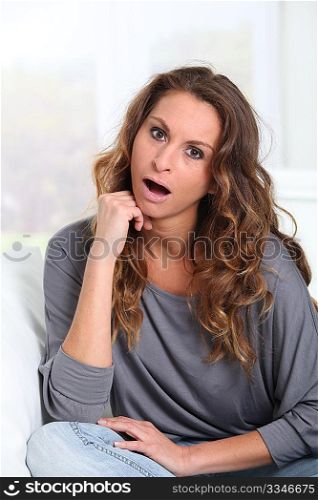 Portrait of woman with surprised look