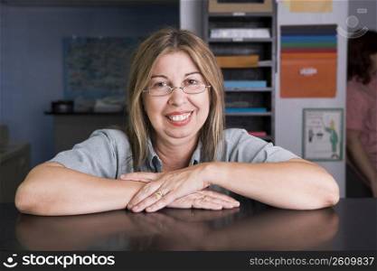 Portrait of woman working in copy center