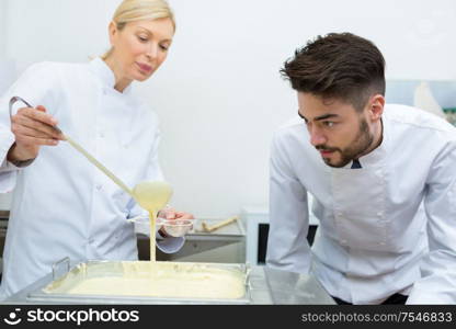 portrait of workers doing handcrafted chocolate