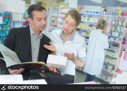 portrait of workers in pharmacy