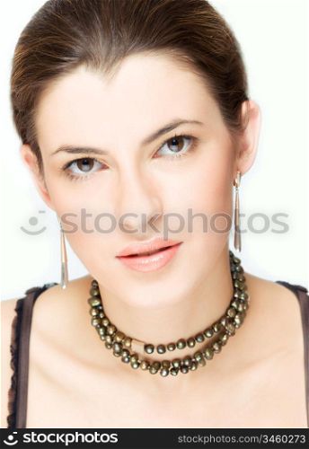 portrait of young adorable woman looking straight to the camera