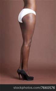 Portrait of young african american woman wearing panty in studio