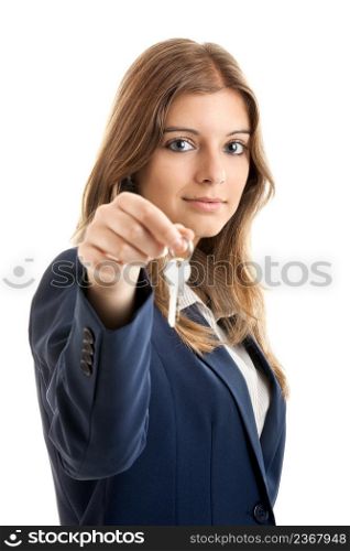 Portrait of Young and beautiful business woman holding keys - Focus is on the model