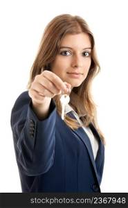 Portrait of Young and beautiful business woman holding keys - Focus is on the model