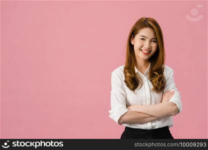 Portrait of young Asia lady with positive expression, arms crossed, smile broadly, dressed in casual clothing and looking at camera over pink background. Happy adorable glad woman rejoices success.