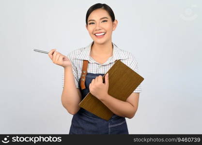 Portrait of young asian woman in waitress uniform holding clipboard and pen for checking order, copy space to insert products for advertisement isolated on white background