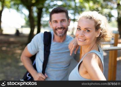 portrait of young attractive happy fitness couple