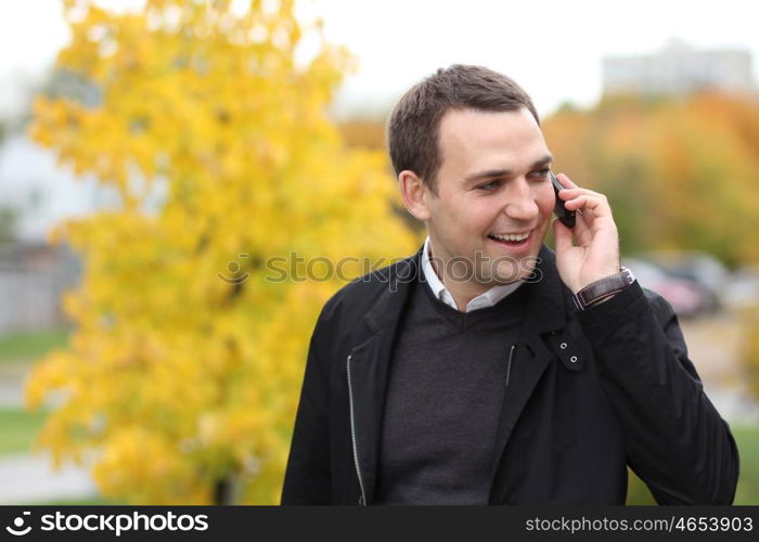 Portrait of young attractive man, outdoors