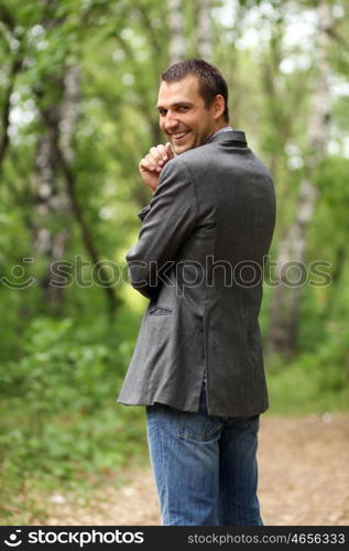 Portrait of young attractive man, outdoors