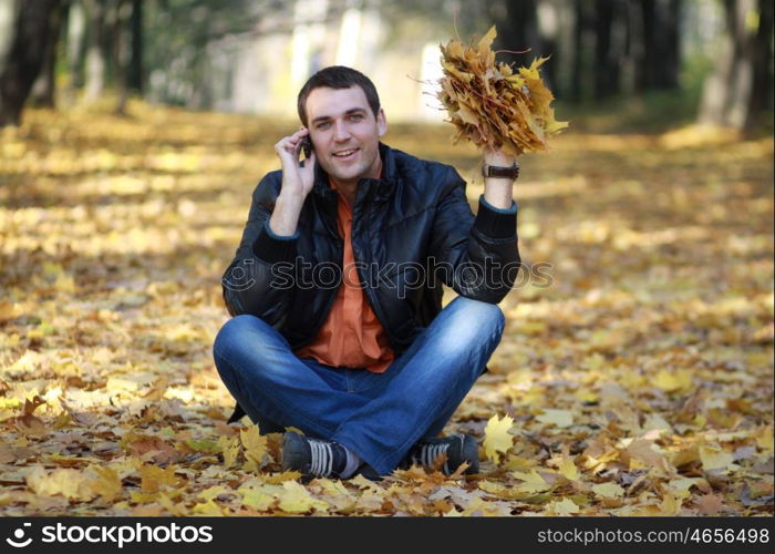 Portrait of young attractive man, outdoors