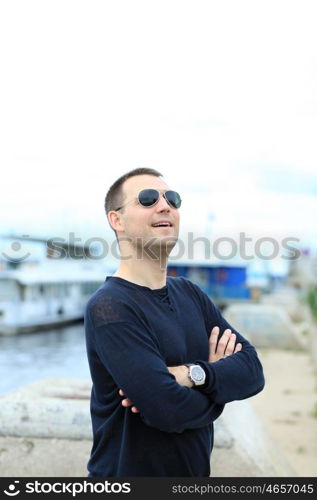 Portrait of young attractive man, outdoors