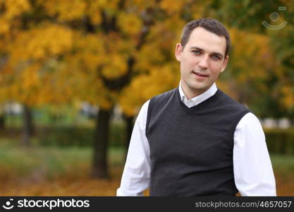 Portrait of young attractive man, outdoors