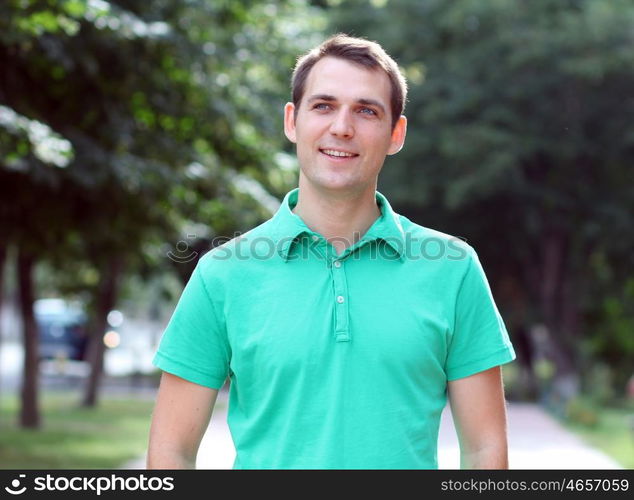 Portrait of young attractive man, outdoors