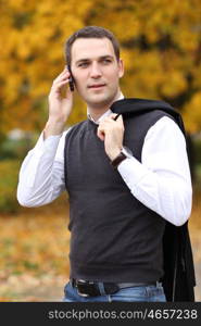 Portrait of young attractive man, outdoors