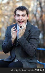 Portrait of young attractive man, outdoors