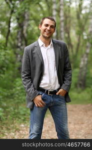 Portrait of young attractive man, outdoors