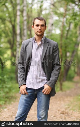 Portrait of young attractive man, outdoors