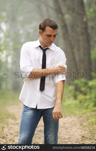 Portrait of young attractive man, outdoors