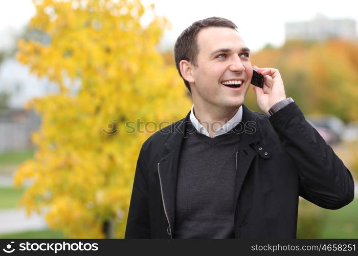 Portrait of young attractive man, outdoors