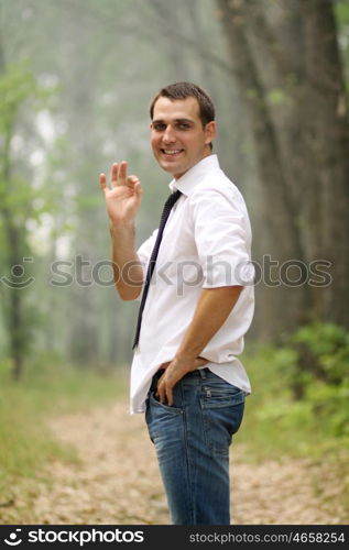 Portrait of young attractive man, outdoors